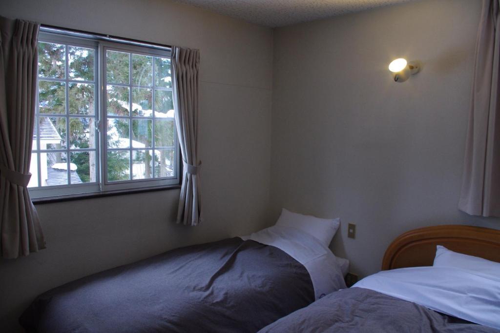 Bed and Breakfast Sunny Side Hut Hakuba Pokój zdjęcie